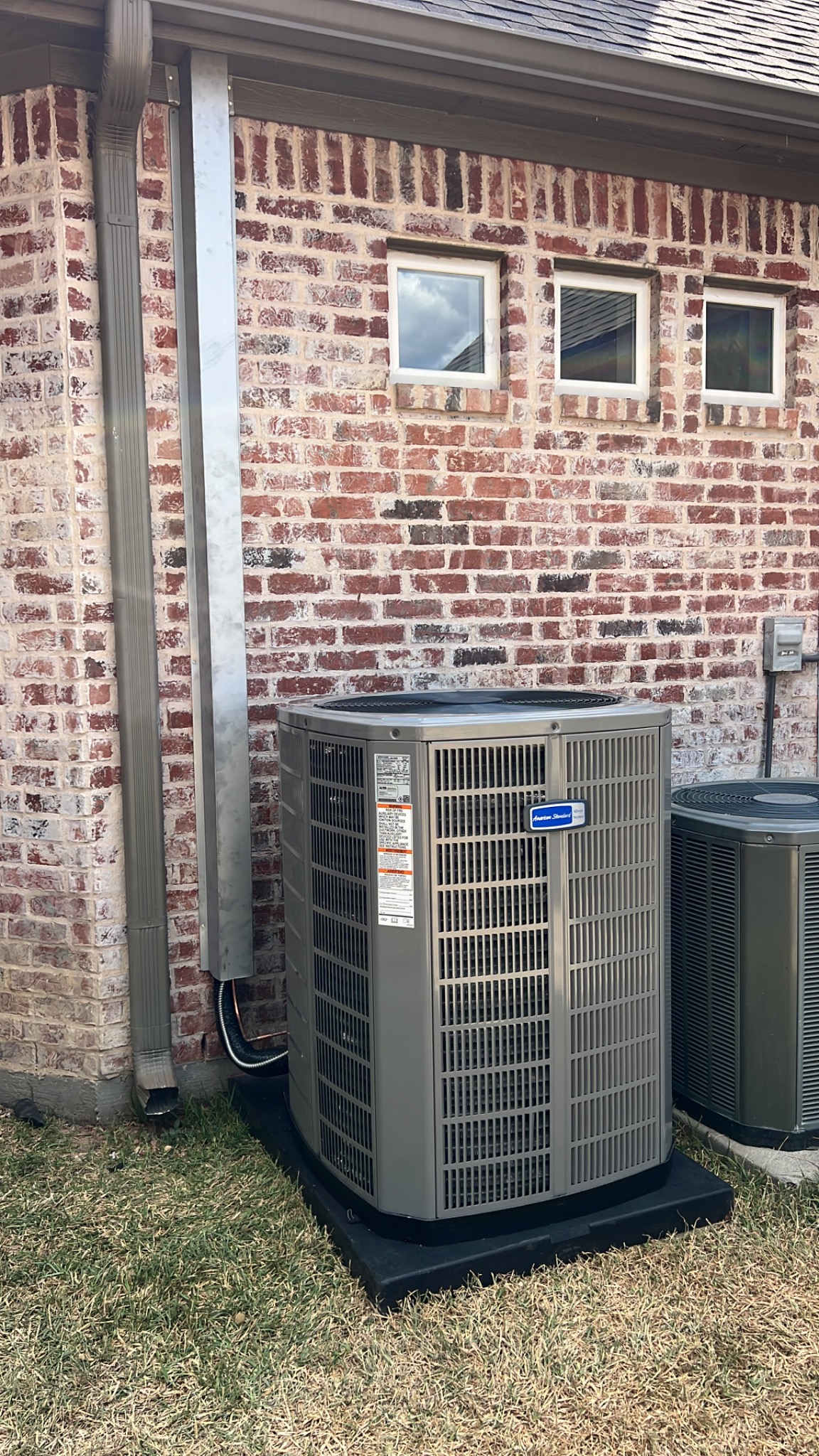 American Standard outdoor HVAC system on equipment pad